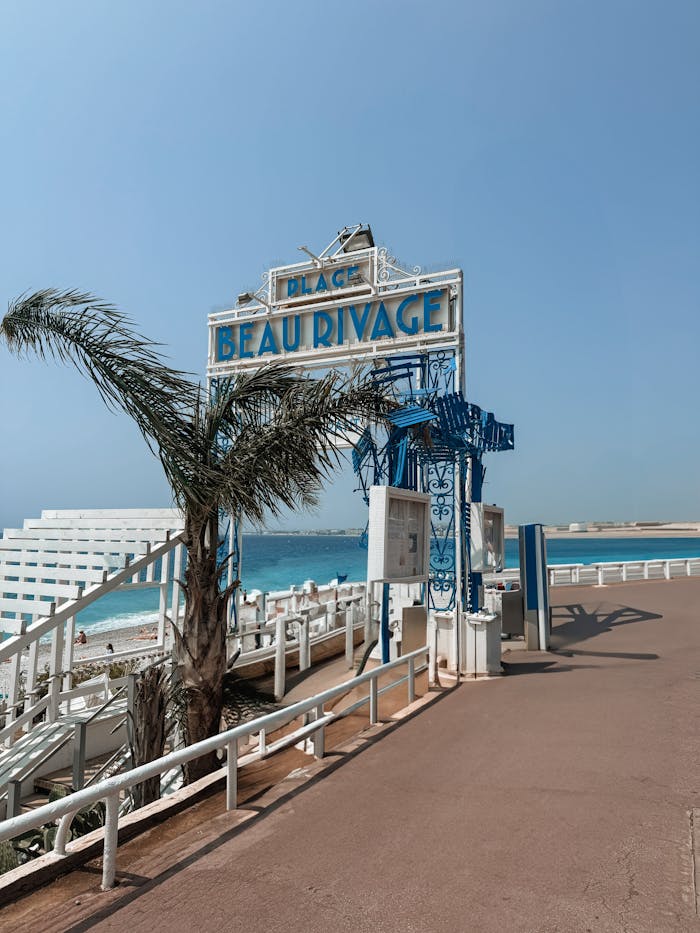 Explore the sunny shores of Plage Beau Rivage in Nice, France, capturing its vibrant beach atmosphere.